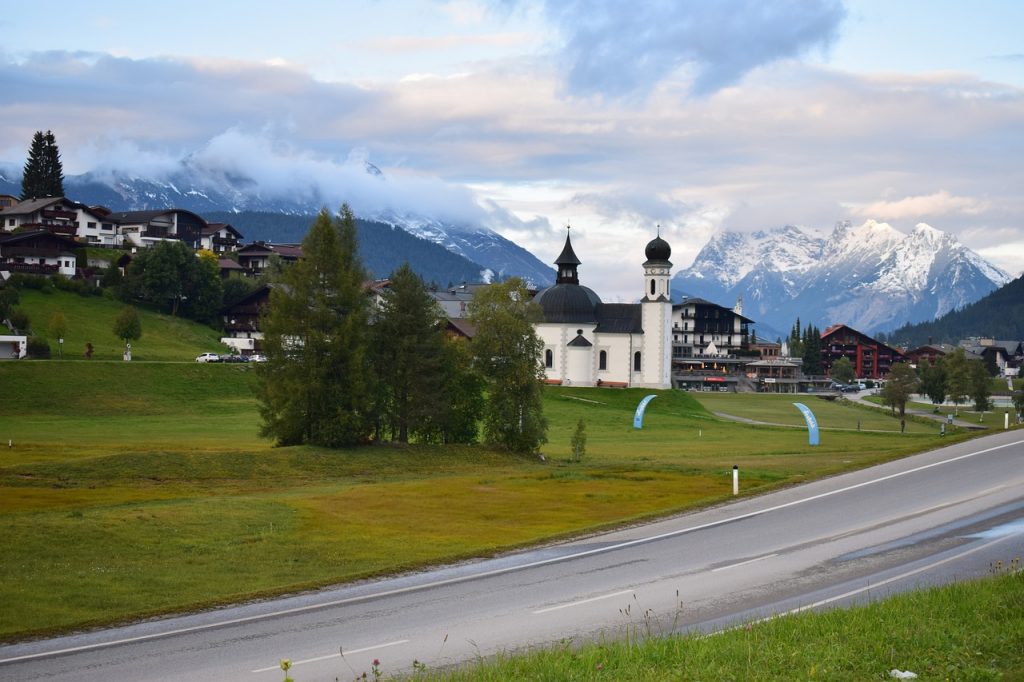 A road with a mountain in the background